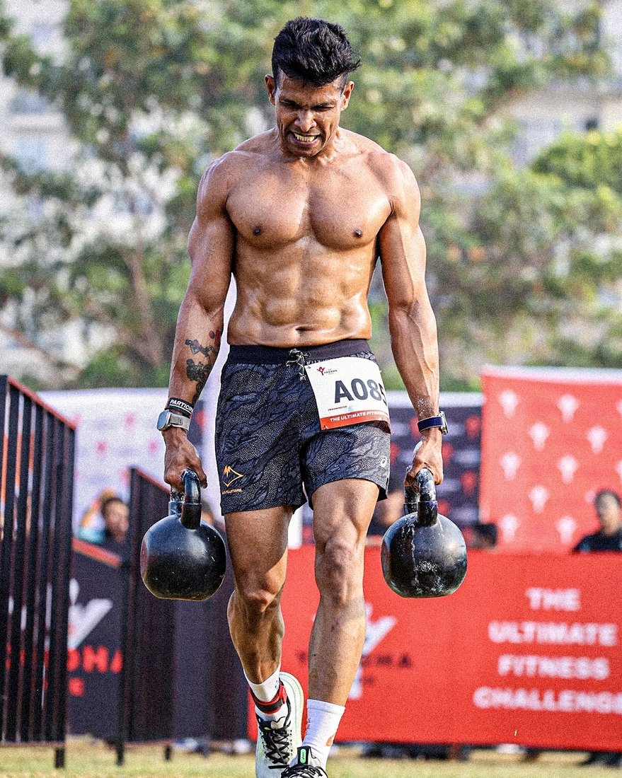 Coach Joby doing a loaded carry at the Yoddha Race